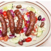 Mediterranean Chicken Sausage · Served with sausage, grape tomatoes, red onions, and feta cheese.