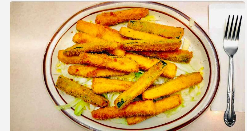Zucchini Fries · Fried julienne zucchini.