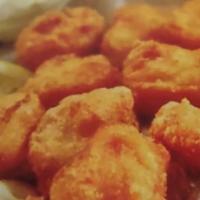 8 pices Fish nuggets · With fries or salad or rice