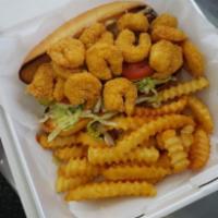 Shrimp Poboy Combo · Fried shrimp overflowing a toasted French roll w/lettuce, tomatoes, pickles and HBC mild sau...