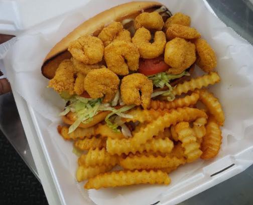 Shrimp Poboy Combo · Fried shrimp overflowing a toasted French roll w/lettuce, tomatoes, pickles and HBC mild sauce.
W/golden French fries
