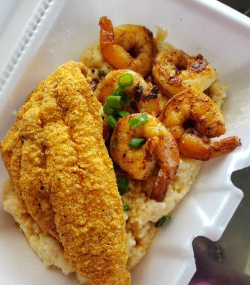 Southern Classic · Our signature shrimp and grits topped with a golden fried catfish fillet and sliced scallions