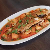 E17. Pan Fried Whole Red Snapper · Served with white rice.