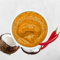 Spicy Red Chutney · A blend made from Kashmiri red chili peppers, cumin, grated coconut with a hint of lemon jui...