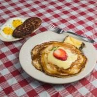 Buttermilk Pancakes (2) · 2 pancakes, choice of meat, grits or potatoes and eggs.