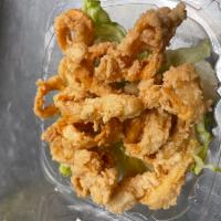 Fried Calamari · Golden crispy calamari served with sweet chili sauce.