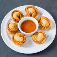 Crab Rangoon · 6 pieces. Crab stick, cream cheese,  wrapped in wonton skin. Served with sweet chili sauce.
