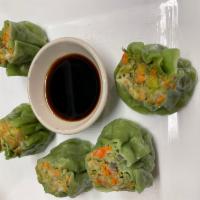Power Balls · 5 dumplings. Spinach and mixed veggie dumplings served with house special black bean sauce.
