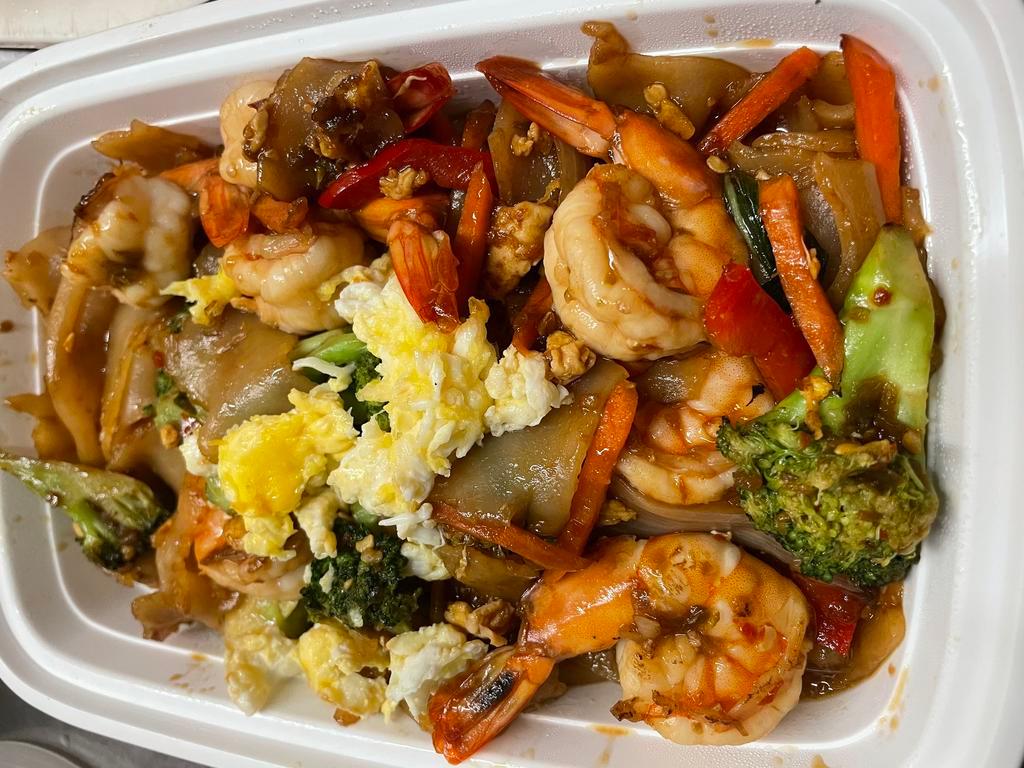 Spicy Drunken Noodle · Pad kee mao. Stir-fried flat noodle with egg, onion, bell pepper, carrot, broccoli, chili and basil sauce. Spicy.