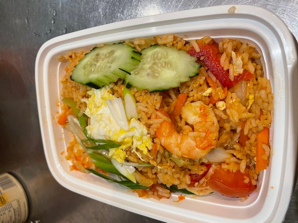 Sriracha Fried Rice · Sauteed carrot, broccoli, egg, tomato, onion and bell pepper with spicy sriracha sauce. Spicy.