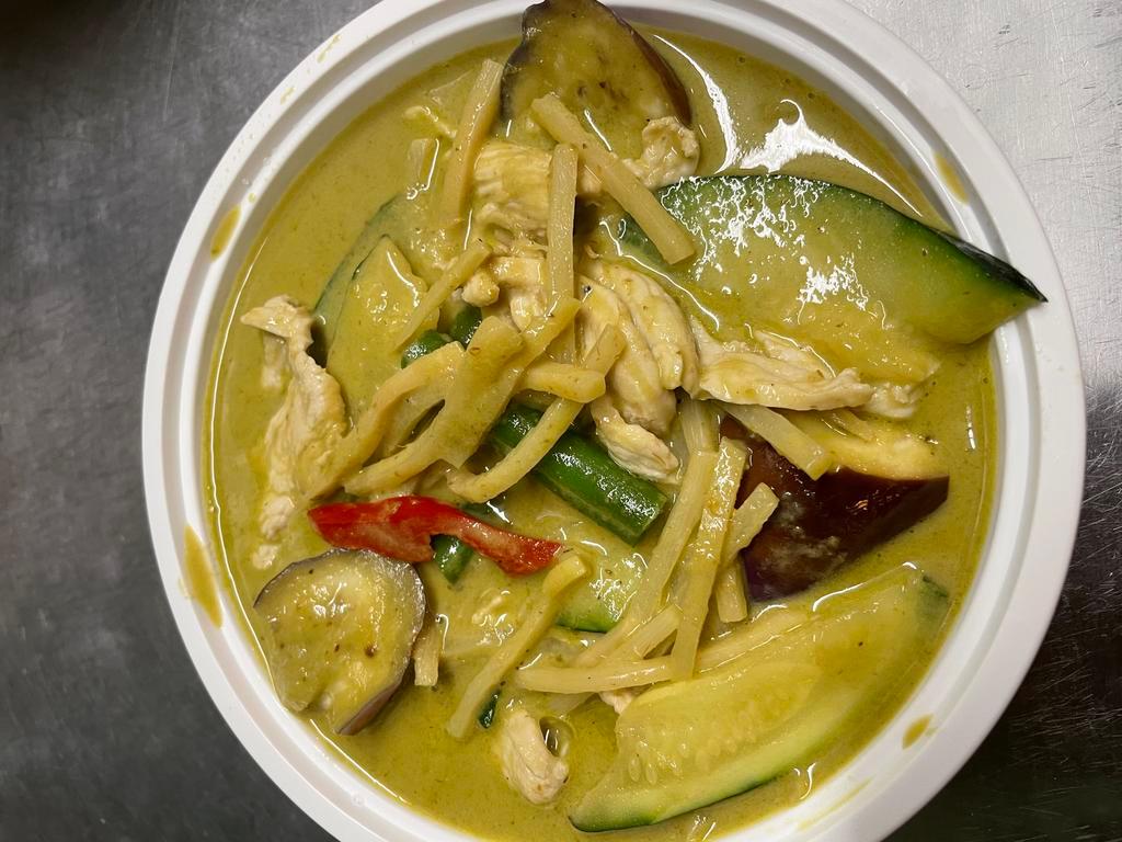 Green Curry · Green curry with bamboo shoot, bell pepper, eggplant, string bean, basil and coconut milk. Served with jasmine rice. Spicy.
