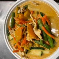 Pumpkin Curry · Pumpkin in curry with basil, string bean and coconut milk. Served with jasmine rice. Spicy.