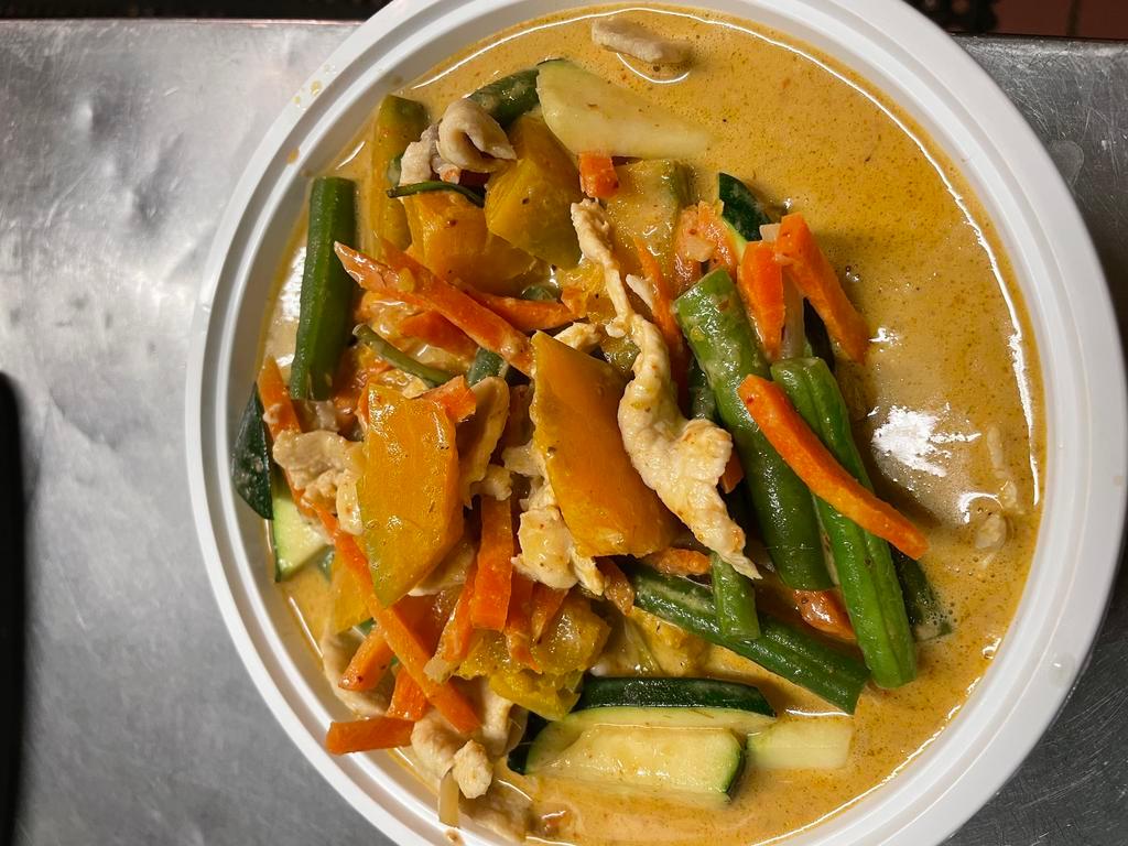 Pumpkin Curry · Pumpkin in curry with basil, string bean and coconut milk. Served with jasmine rice. Spicy.