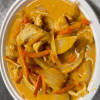 Yellow Curry · Yellow curry with coconut milk, onions, potato and carrot. Served with jasmine rice. Spicy.