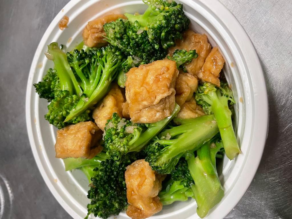 Broccoli Tofu · Sauteed broccoli and tofu with fresh garlic sauce. Served with jasmine rice.
