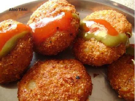 Aloo Tikki · Deep fried round shaped potato patties with mild spice. Vegan. 