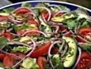 House Green Salad · Fresh lettuce mixed with tomatoes, cucumber and onions. Vegan. 