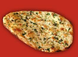 Tandoori Naan · Unleavened bread cooked in our own tandoori oven. Baked fresh to order. 