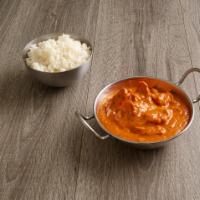Chicken Makhani · Boneless chicken cooked with onions, garlic, ginger, tomatoes, butter, cream and curry spice...