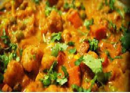 Vegetable Mango Korma · Mixed vegetables cooked with ground mango and cashew, yogurt and curry spices. Served with s...