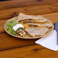 Quesadilla · meat choice and cheese. Lettuce, pico, sour cream and guac on a side