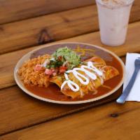 Enchilada Plate · Choice of meat, rice, beans, cheese topping with sour cream and pico and guacamole.