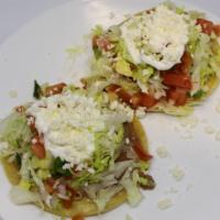 Sopes · 2x - choice of meat, beans, lettuce, pico, cheese, sour cream