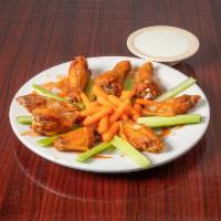 Buffalo Wings · Bone-in wings. Spicy wings served with fresh-cut vegetables.