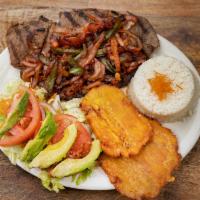 CARNE ENCEBOLLADA- GRILLED STEAK with ONIONS · Grilled steak with onions. Served with rice, salad and fried green plantains.