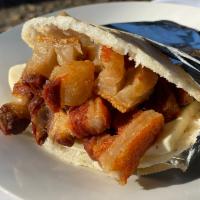 Arepa con Chicharron · Arepa with Chicharron