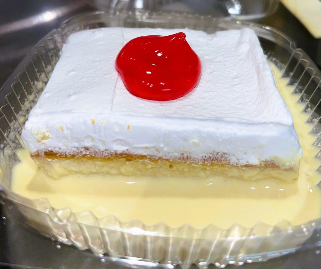 TRES LECHES · Tres leches literally means, “three milks”  and tres leches cake is an ultra light sponge cake soaked in a sweet milk mixture.  Tres leches cake is a popular cake in Colombia and Latin America.  