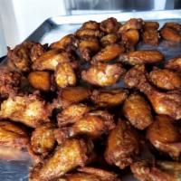 Chicken Wings 25 or 50 Pieces · Seasoned fresh chicken wings never frozen lightly breaded wings only no fries 