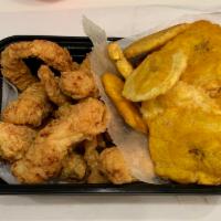 DRY SPICED CHCHARRON DE POLLO · Served with a side of Tostones or French Fries 