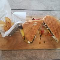 Philly Cheese Steak Panini w Fries · American cheese, onion, peppers, mayo and fries
