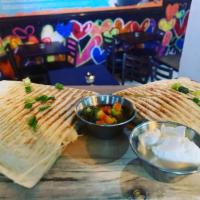 Quesadillas · Made to Order Grilled Steak Chicken or Pork and Mozzarella Cheese with Pico and sour cream o...