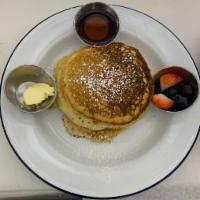 4 Butter Milk Pancakes · 4 Homemade Butter Milk Pancakes served with side of fruits, butter and syrup 