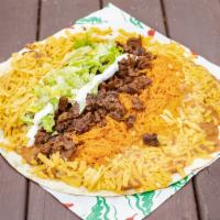 El Big Daddy Mexican Burrito  · 13 inch flour tortilla wraps  Refried beans with rice, cheese, lettuce , sour cream , and ch...