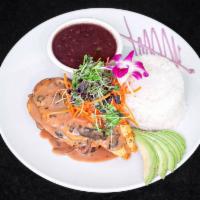 Pollo Criollo · Grilled chicken breast, avocado, maduros, white rice, black beans, criolla sauce.