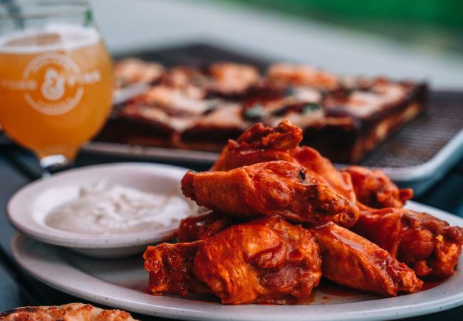 Chicken Wings  (10) · Chicken wings (10) served with your side of wing sauce and blue cheese dressing.