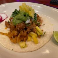 Al Pastor Taco · Spicy Pork With Pineapple, Corn Tortilla, Guacamole, Cilantro, And Onion, With Side Of Radis...