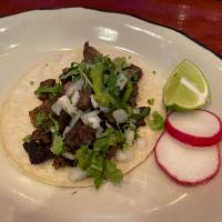 Carne Asada Taco  · Beef, Corn Tortilla, Guacamole, Cilantro, And Onion, With Side Of Radish, And Lime