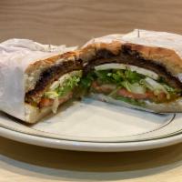  Milanesa de Res Torta  · Breaded Beef, Lettuce, Tomato, Mayonnaise, Avocado, Black Beans, Fried Cheese, and Jalapeno