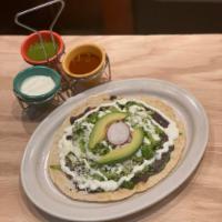 Huaraches · Flat Corn Dough Topped With Sour Cream, Cotija Cheese, Avocado