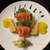 Salmon Don · Sliced fresh salmon over sushi rice.