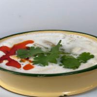 Coconut Soup  · Tom Kha Soup. Creamy coconut milk, lemongrass, mushrooms, scallions, and cilantro in galanga...