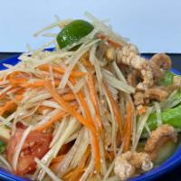 Papaya Salad · Som tum. Green papaya, dry shrimp, peanut, long beans, tomatoes, carrots with fresh Thai chi...