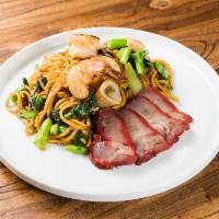 Phuket Lo Mein · Southern style sauteed lo mein noodles, roasted pork, shrimp, squid, and Chinese broccoli wi...