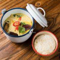 Green Curry (GF) · Thai eggplants, bamboo shoots, basil, and green curry paste in coconut milk, served with rice.