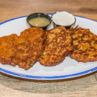 Latkes · Traditional home made fried potato patties served with your choice of applesauce or sour cre...