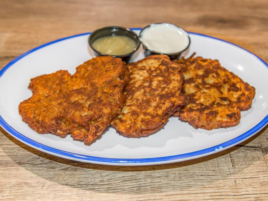 Latkes · Traditional home made fried potato patties served with your choice of applesauce or sour cream. They wont last 8 nights, but boy they miraculous.